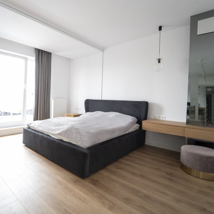 Realizacja MiD Meble w Warszawie: nowoczesne meble na wymiar – kuchnia, zabudowa RTV, konsola, ściana lustrzana i fornirowane detale. MiD Prestige